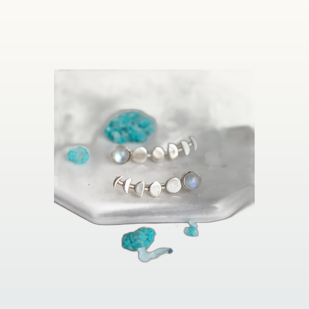 Platinum Stud Earrings With A Classic Opal Bezel Setting